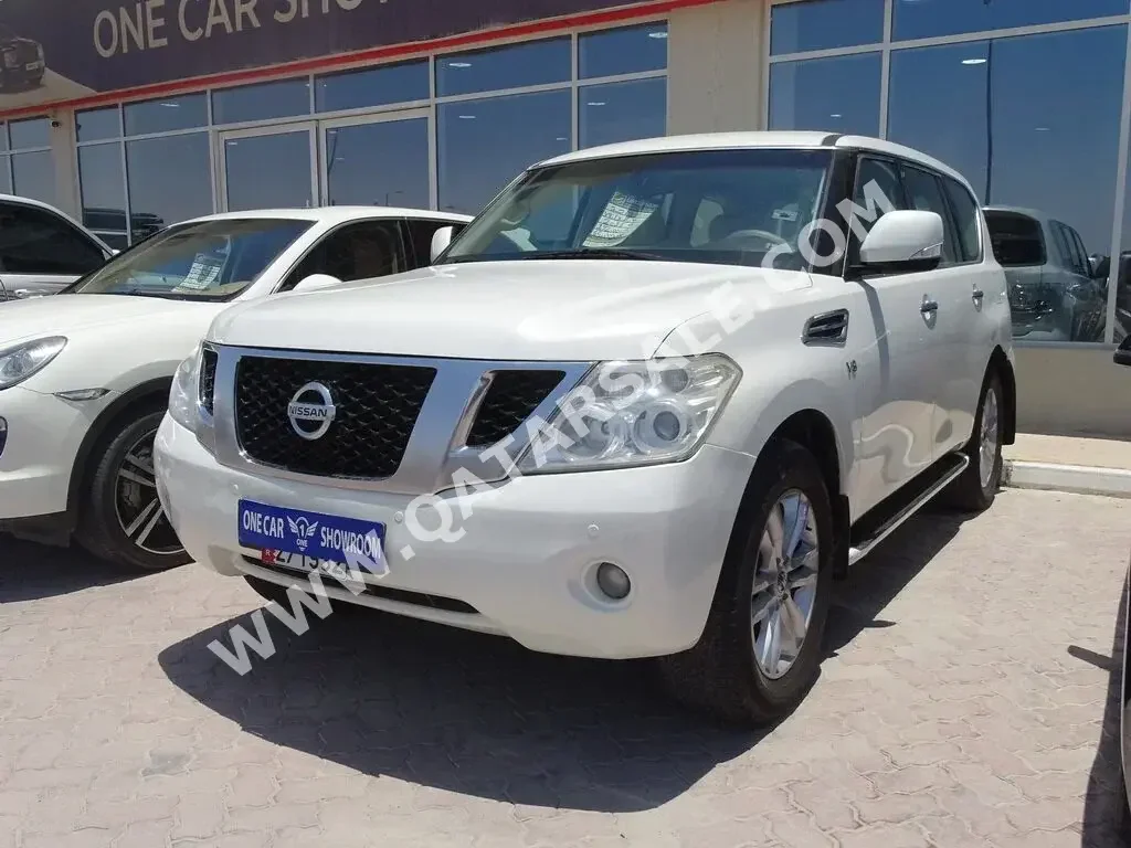 Nissan  Patrol  LE  2013  Automatic  192,000 Km  8 Cylinder  Four Wheel Drive (4WD)  SUV  White  With Warranty