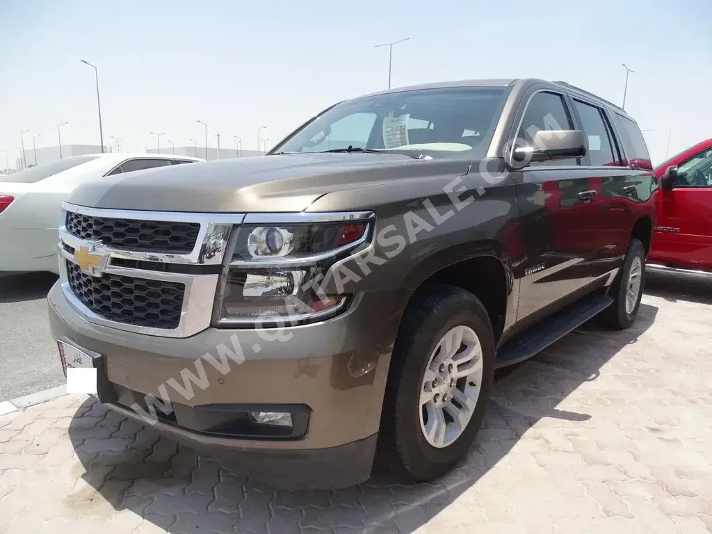 Chevrolet  Tahoe  2017  Automatic  170,000 Km  8 Cylinder  Four Wheel Drive (4WD)  SUV  Brown  With Warranty