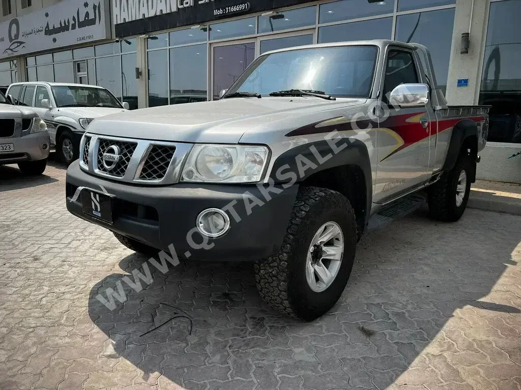 Nissan  Patrol  Pickup  2013  Manual  217,000 Km  6 Cylinder  Four Wheel Drive (4WD)  Pick Up  Silver  With Warranty