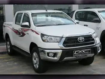  Toyota  Hilux  2023  Automatic  0 Km  4 Cylinder  Four Wheel Drive (4WD)  Pick Up  White  With Warranty