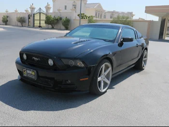 Ford  Mustang  2013  Manual  51٬400 Km  8 Cylinder  Rear Wheel Drive (RWD)  Coupe / Sport  Black