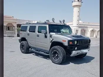 Hummer  H2  2004  Automatic  74,000 Km  8 Cylinder  Four Wheel Drive (4WD)  SUV  Silver  With Warranty