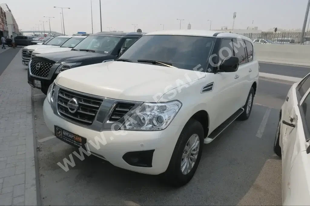Nissan  Patrol  XE  2019  Automatic  123,000 Km  6 Cylinder  Four Wheel Drive (4WD)  SUV  White  With Warranty