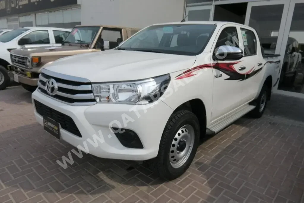 Toyota  Hilux  2023  Automatic  10,000 Km  4 Cylinder  Four Wheel Drive (4WD)  Pick Up  White  With Warranty
