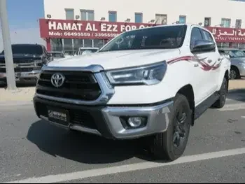 Toyota  Hilux  SR5  2022  Automatic  55,000 Km  4 Cylinder  Four Wheel Drive (4WD)  Pick Up  White  With Warranty