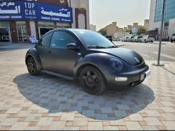 Volkswagen  Beetle  2003  Automatic  120,000 Km  4 Cylinder  Rear Wheel Drive (RWD)  Hatchback  Gray