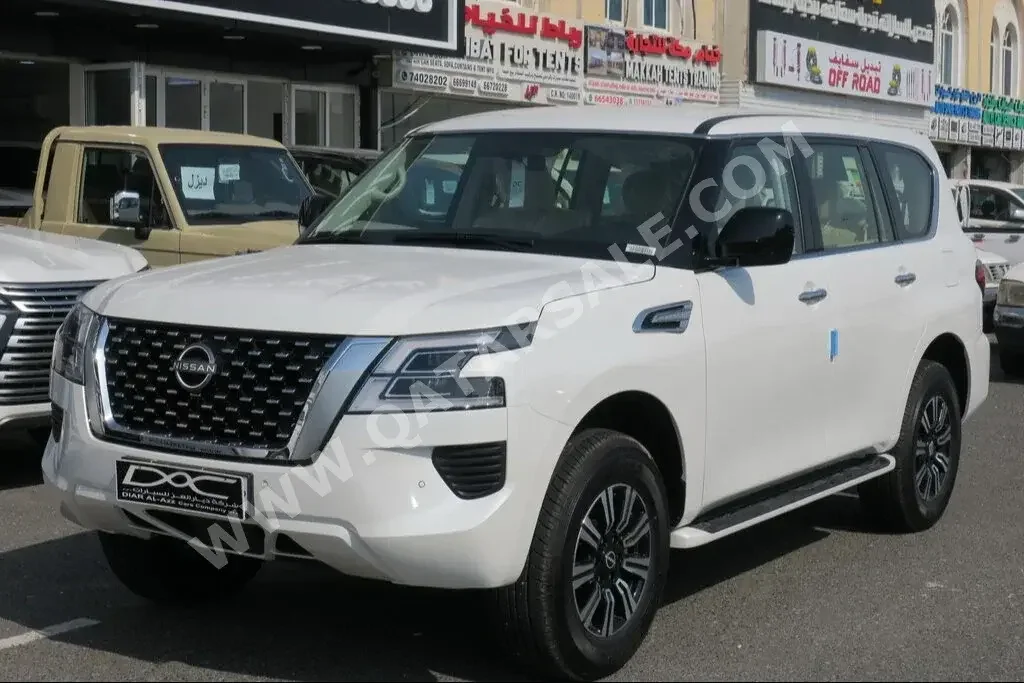 Nissan  Patrol  XE  2023  Automatic  0 Km  6 Cylinder  Four Wheel Drive (4WD)  SUV  White  With Warranty