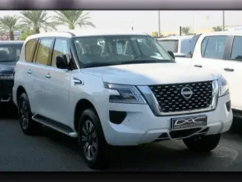 Nissan  Patrol  XE  2023  Automatic  0 Km  6 Cylinder  Four Wheel Drive (4WD)  SUV  White  With Warranty
