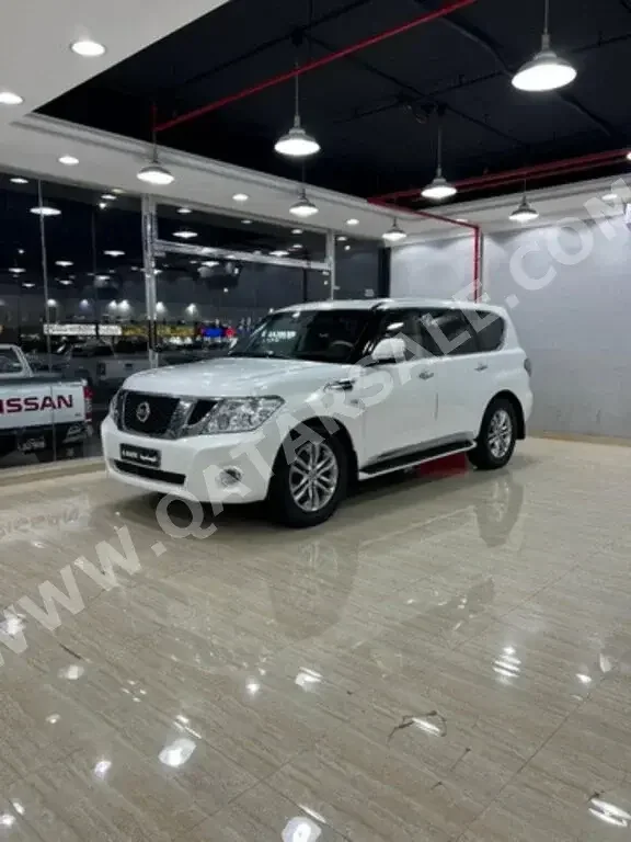 Nissan  Patrol  LE  2012  Automatic  184,000 Km  8 Cylinder  Four Wheel Drive (4WD)  SUV  White