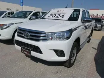Toyota  Hilux  2024  Automatic  187 Km  4 Cylinder  Four Wheel Drive (4WD)  Pick Up  White  With Warranty