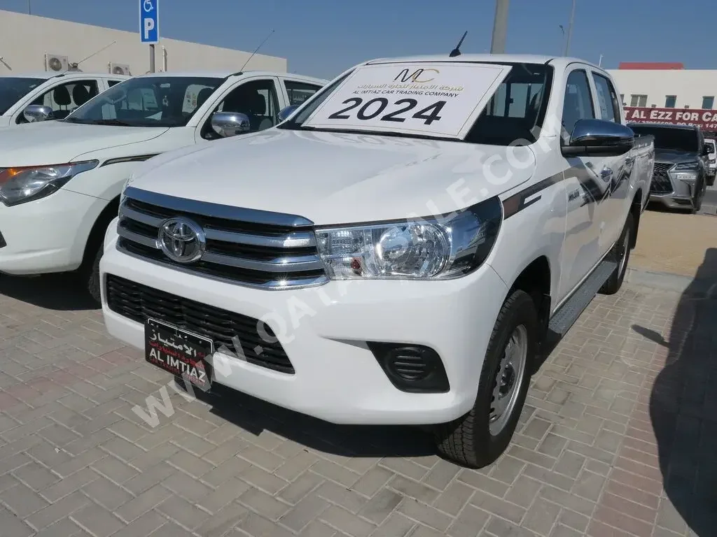 Toyota  Hilux  2024  Automatic  187 Km  4 Cylinder  Four Wheel Drive (4WD)  Pick Up  White  With Warranty