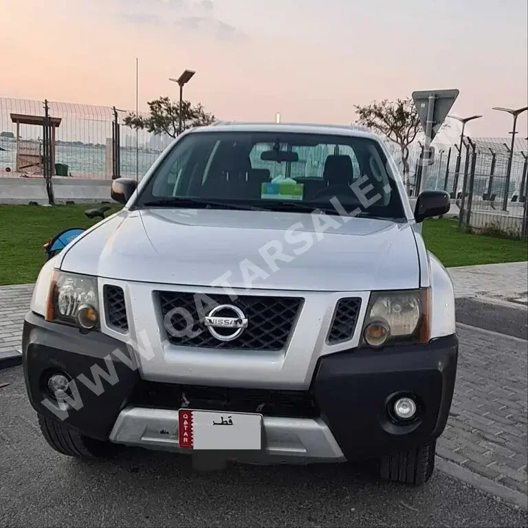Nissan  Xterra  2010  Automatic  380,000 Km  6 Cylinder  Four Wheel Drive (4WD)  SUV  Gray