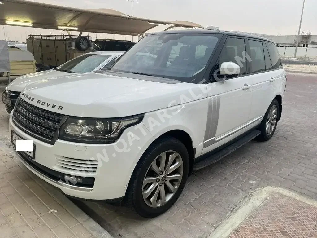 Land Rover  Range Rover  HSE  2014  Automatic  203,000 Km  8 Cylinder  Four Wheel Drive (4WD)  SUV  White