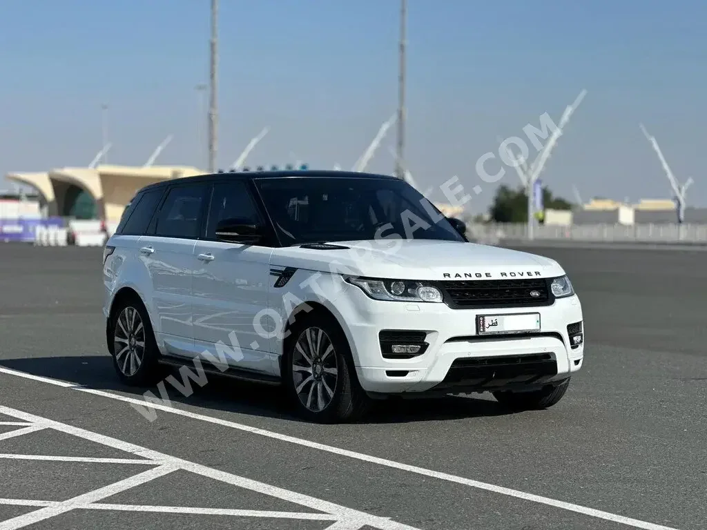 Land Rover  Range Rover  Sport HSE  2014  Automatic  158,000 Km  8 Cylinder  Four Wheel Drive (4WD)  SUV  White
