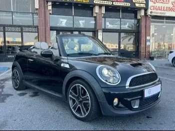 Mini  Cooper  S  2015  Automatic  95,000 Km  4 Cylinder  Front Wheel Drive (FWD)  Convertible  Black