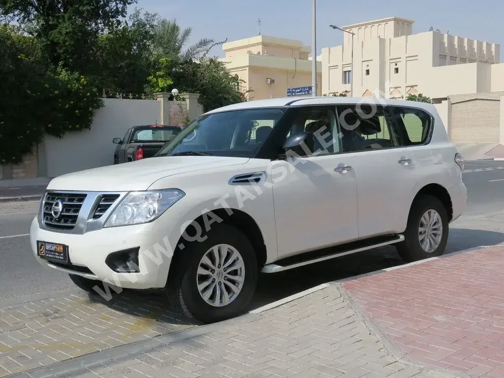 Nissan  Patrol  XE  2019  Automatic  163,000 Km  6 Cylinder  Four Wheel Drive (4WD)  SUV  White