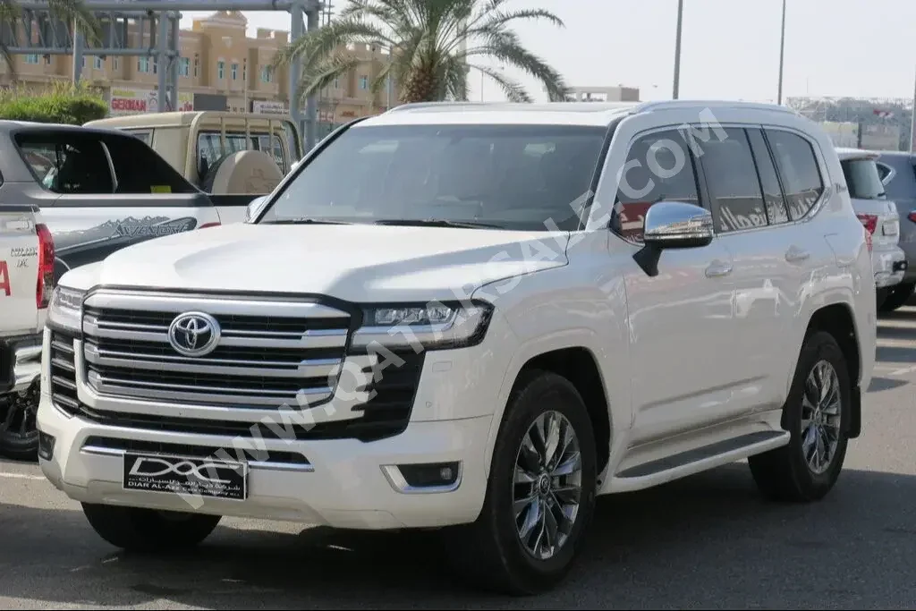 Toyota  Land Cruiser  VX Twin Turbo  2022  Automatic  83,000 Km  6 Cylinder  Four Wheel Drive (4WD)  SUV  White  With Warranty