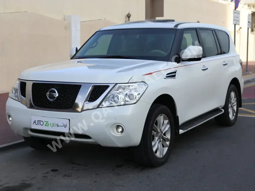 Nissan  Patrol  LE  2010  Automatic  211,000 Km  8 Cylinder  Four Wheel Drive (4WD)  SUV  White