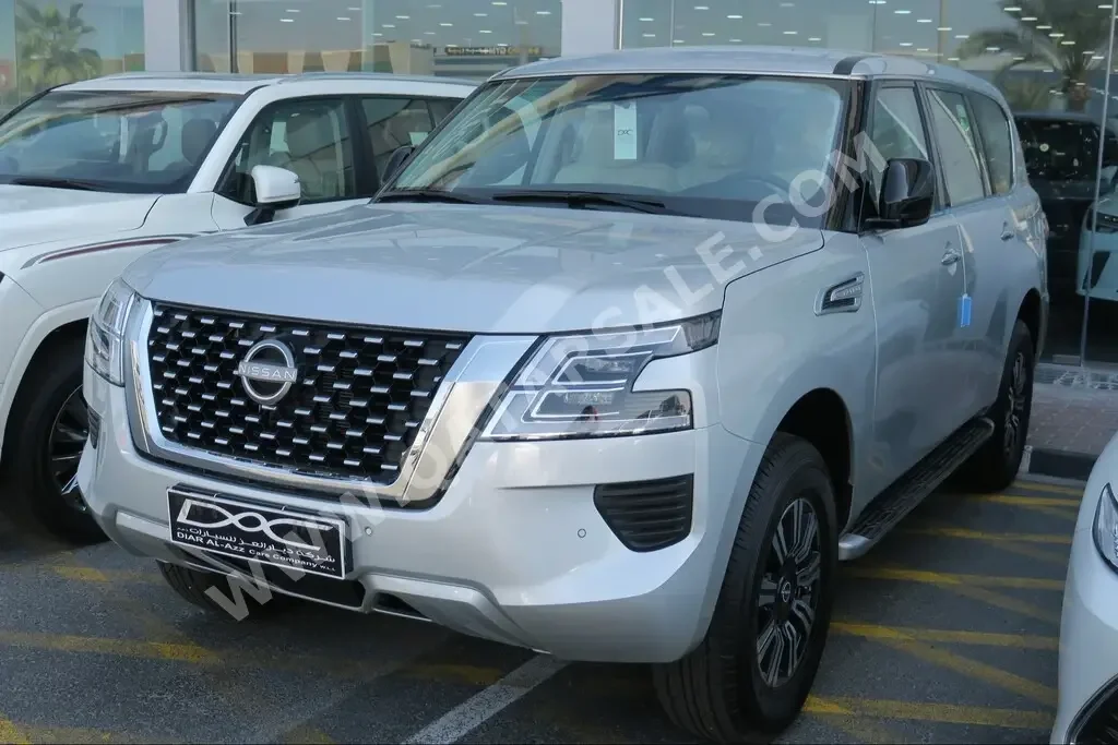 Nissan  Patrol  XE  2023  Automatic  0 Km  6 Cylinder  Four Wheel Drive (4WD)  SUV  Gray  With Warranty