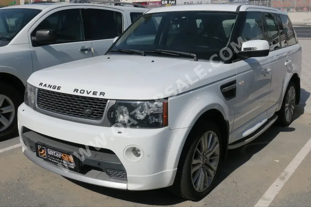 Land Rover  Range Rover  Sport HSE  2013  Automatic  127,000 Km  8 Cylinder  Four Wheel Drive (4WD)  SUV  White
