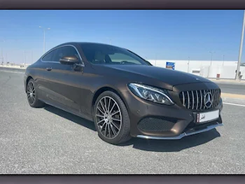 Mercedes-Benz  C-Class  300  2017  Automatic  110,000 Km  4 Cylinder  Rear Wheel Drive (RWD)  Coupe / Sport  Brown