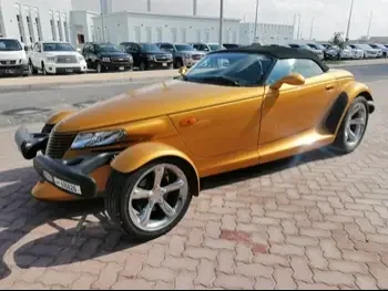 Chrysler  Prowler  2002  Automatic  6,500 Km  8 Cylinder  Rear Wheel Drive (RWD)  Convertible  Gold