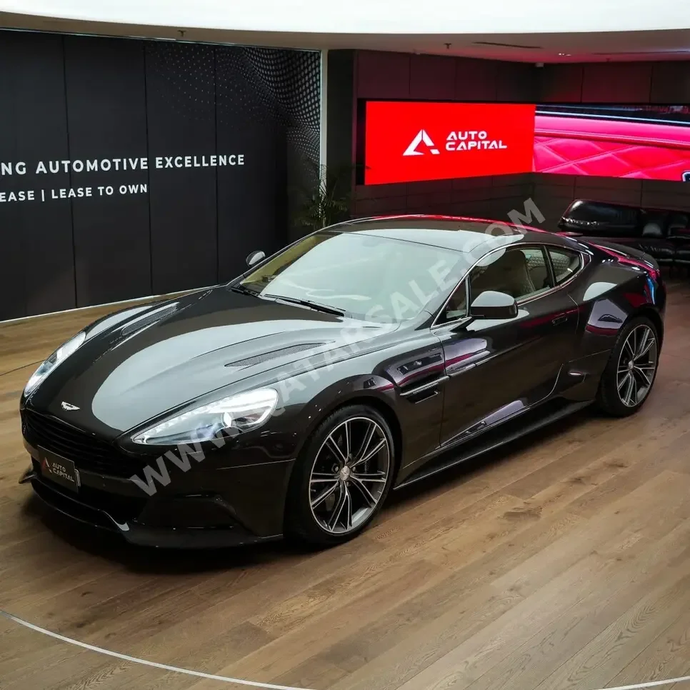 Aston Martin  Vanquish  2015  Automatic  4,000 Km  6 Cylinder  Rear Wheel Drive (RWD)  Coupe / Sport  Black