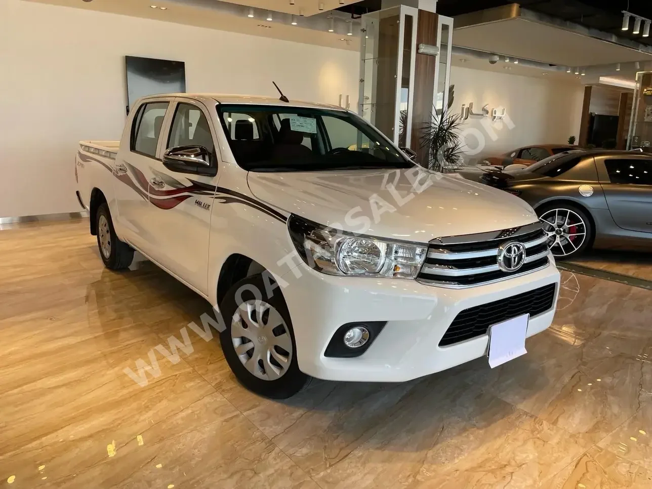Toyota  Hilux  2020  Automatic  35,000 Km  4 Cylinder  Rear Wheel Drive (RWD)  Pick Up  White