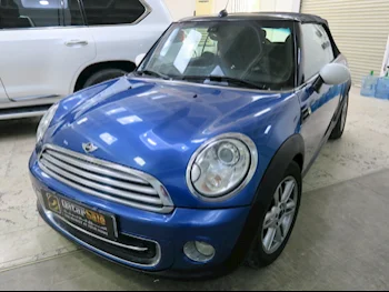 Mini  Cooper  2014  Automatic  88٬000 Km  4 Cylinder  Front Wheel Drive (FWD)  Convertible  Blue