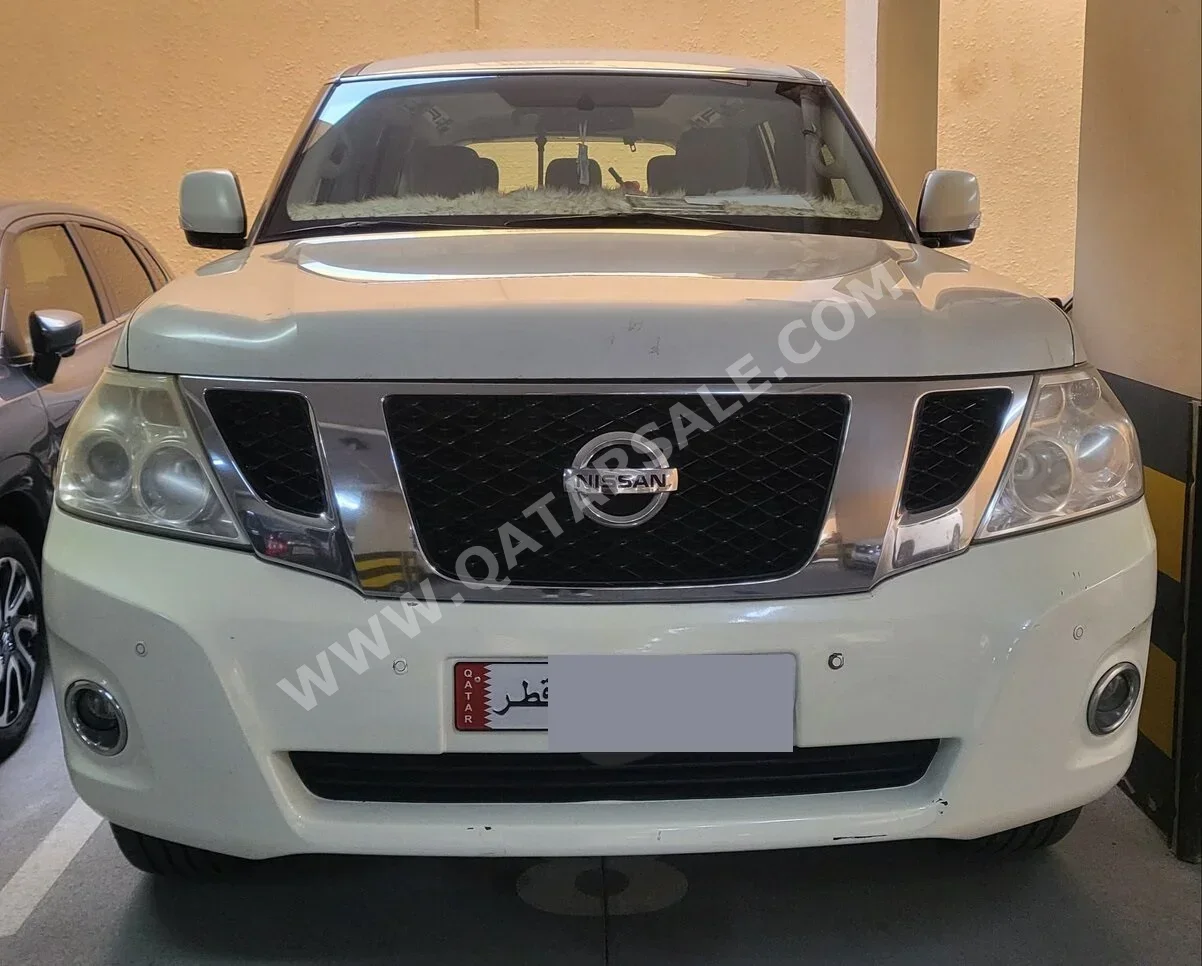 Nissan  Patrol  LE  2012  Automatic  211,671 Km  8 Cylinder  Four Wheel Drive (4WD)  SUV  White