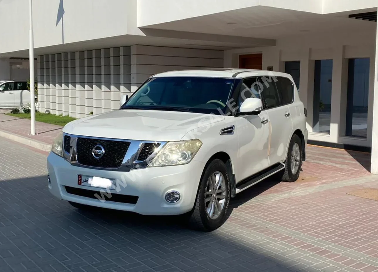  Nissan  Patrol  LE  2012  Automatic  198,000 Km  8 Cylinder  Four Wheel Drive (4WD)  SUV  White  With Warranty