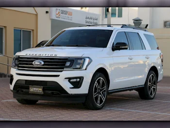  Ford  Expedition  2021  Automatic  58,000 Km  6 Cylinder  Four Wheel Drive (4WD)  SUV  White  With Warranty