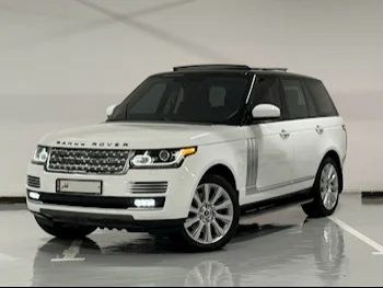 Land Rover  Range Rover  Vogue SE Super charged  2013  Automatic  120,000 Km  8 Cylinder  Four Wheel Drive (4WD)  SUV  White