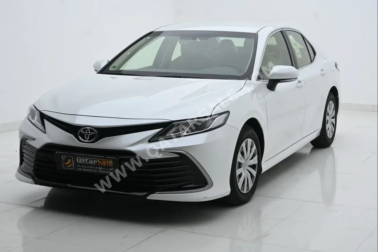 Toyota  Camry  LE  2022  Automatic  32,133 Km  4 Cylinder  Front Wheel Drive (FWD)  Sedan  White  With Warranty