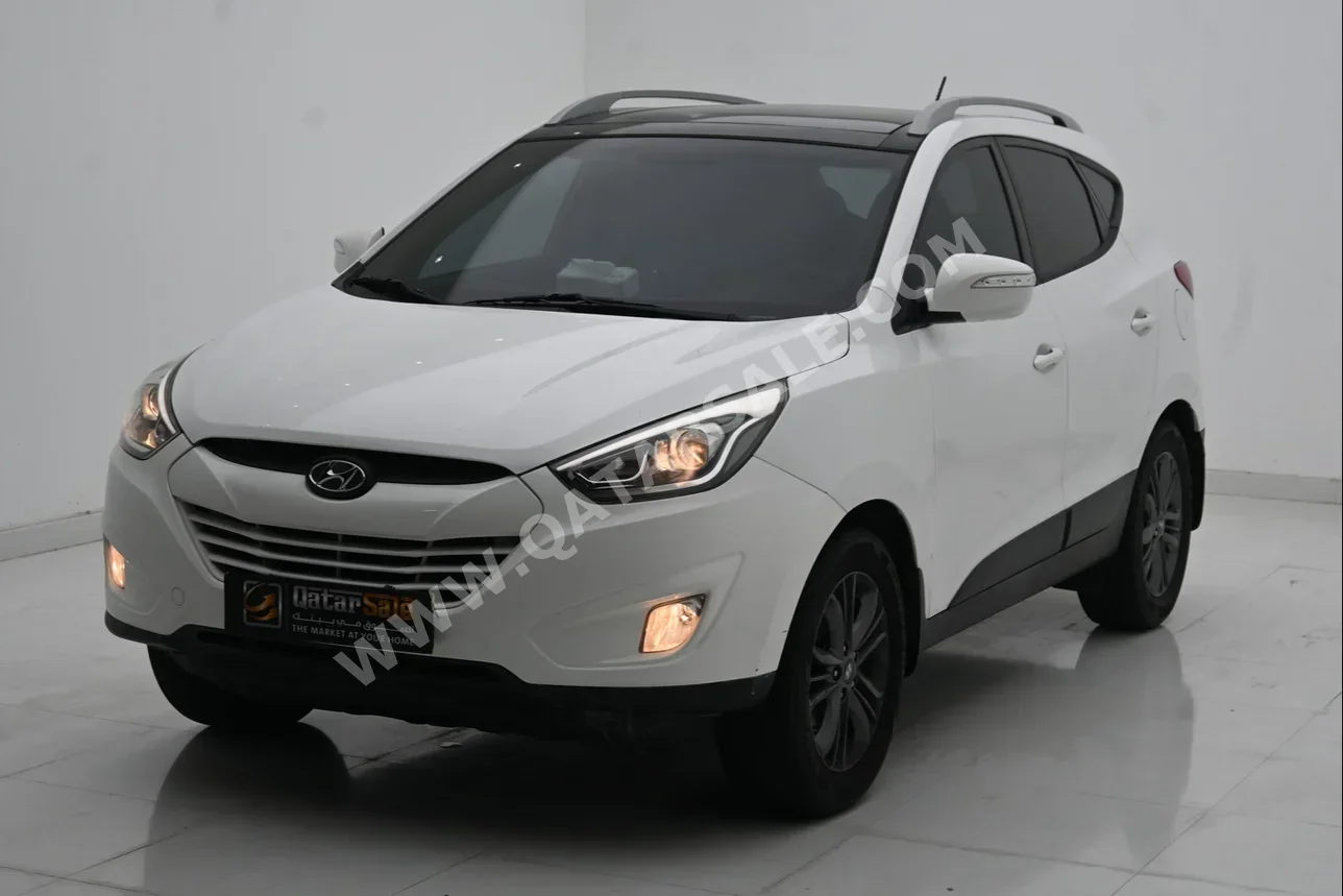 Hyundai  Tucson  Limited  2016  Automatic  135,000 Km  4 Cylinder  Front Wheel Drive (FWD)  SUV  White
