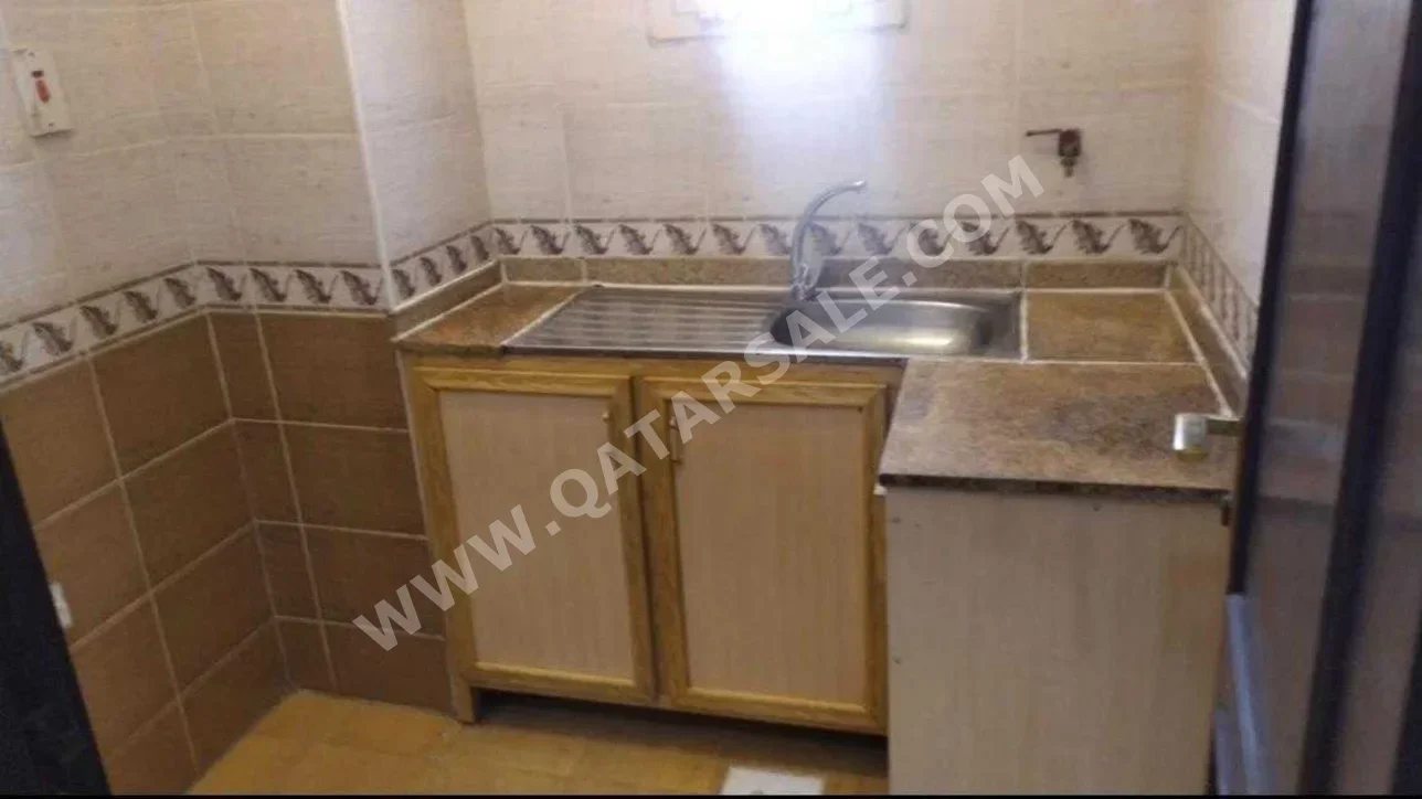 4 Bedrooms  Apartment  For Rent  in Al Rayyan -  Al Aziziyah  Not Furnished