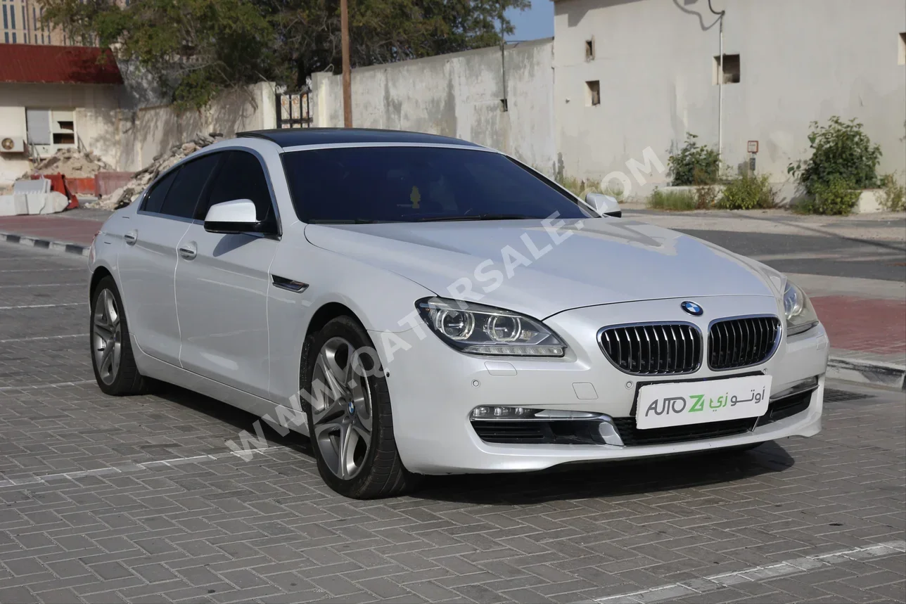 BMW  6-Series  640i  2013  Automatic  119,400 Km  6 Cylinder  Rear Wheel Drive (RWD)  Sedan  White