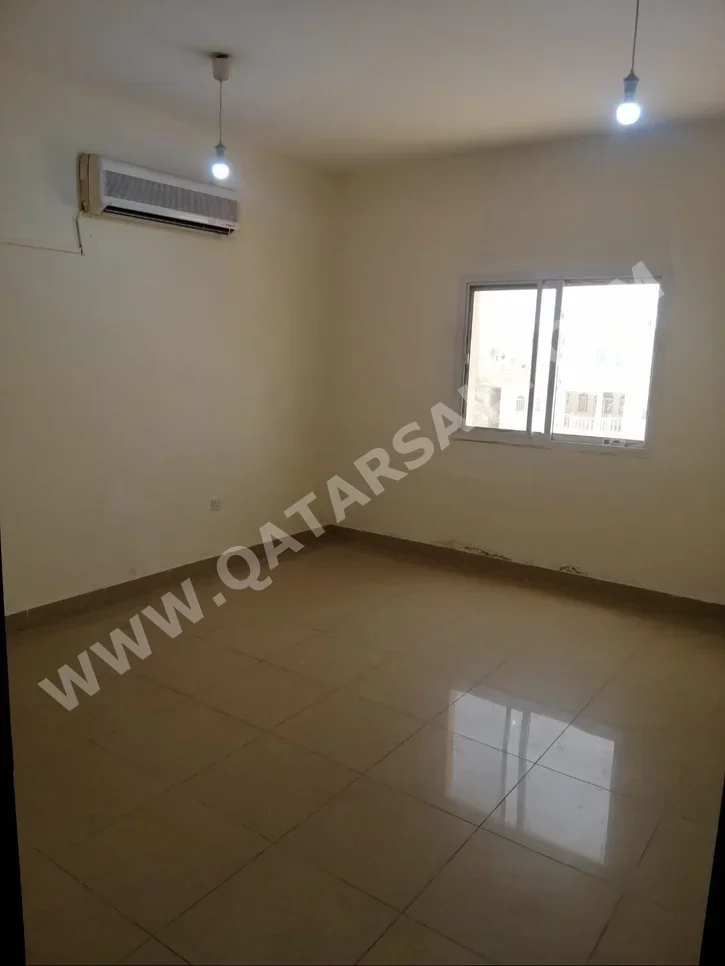 2 Bedrooms  Apartment  For Rent  in Doha -  Fereej Kulaib  Not Furnished