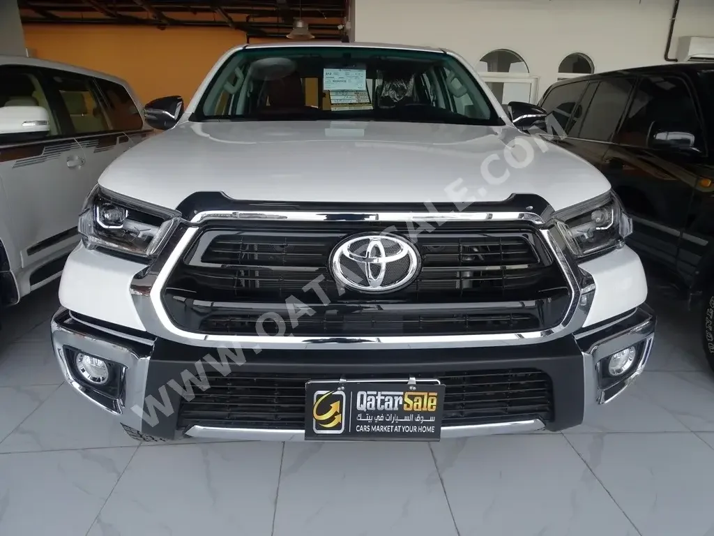 Toyota  Hilux  2022  Automatic  0 Km  4 Cylinder  Four Wheel Drive (4WD)  Pick Up  White  With Warranty