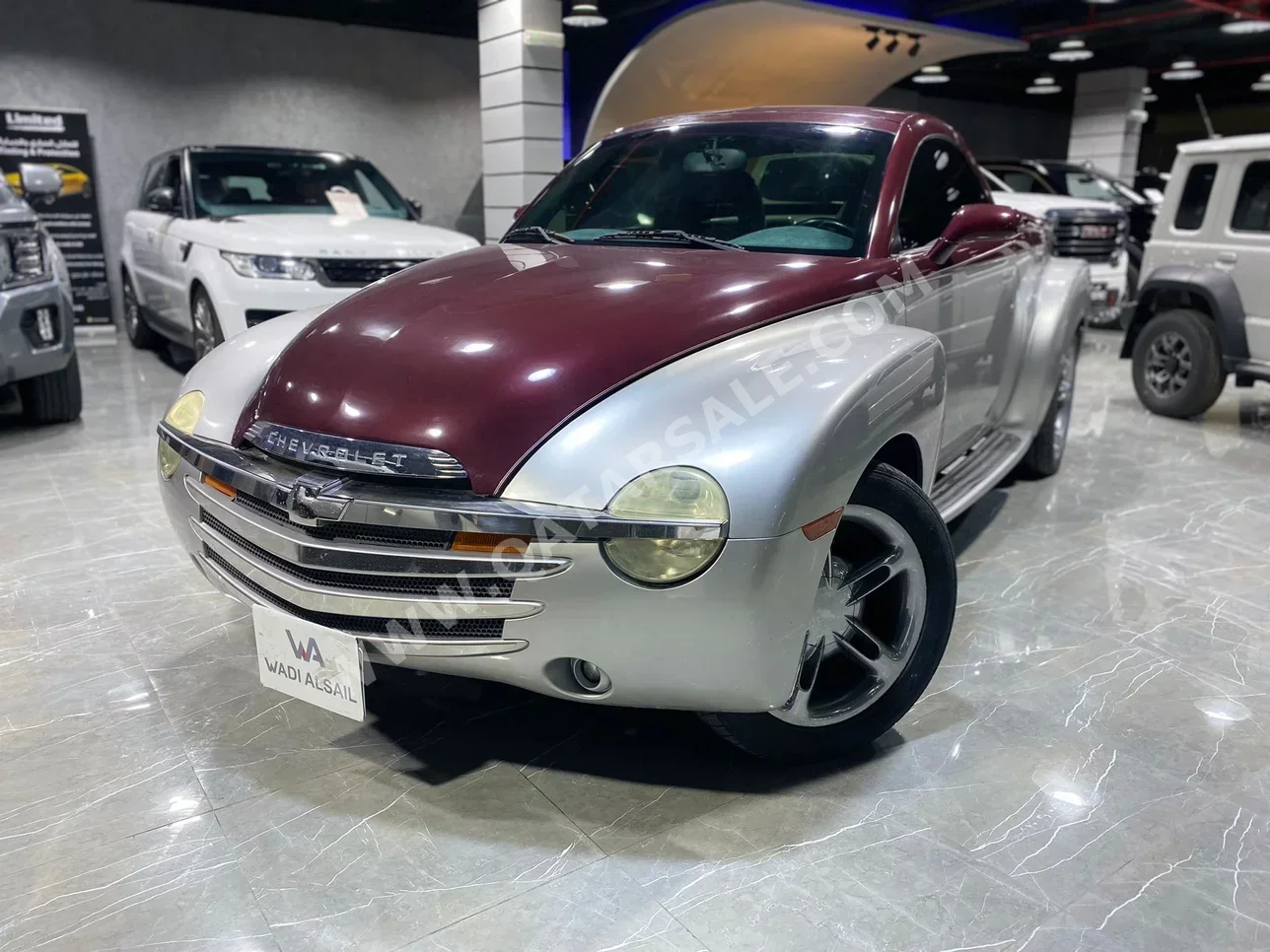Chevrolet  SSR  2005  Automatic  157,000 Km  6 Cylinder  All Wheel Drive (AWD)  Pick Up  Red and Silver
