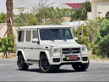  Mercedes-Benz  G-Class  63 AMG  2015  Automatic  143,000 Km  8 Cylinder  Four Wheel Drive (4WD)  SUV  White  With Warranty