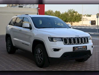 Jeep  Grand Cherokee  Laredo  2019  Automatic  62,000 Km  6 Cylinder  Four Wheel Drive (4WD)  SUV  White  With Warranty