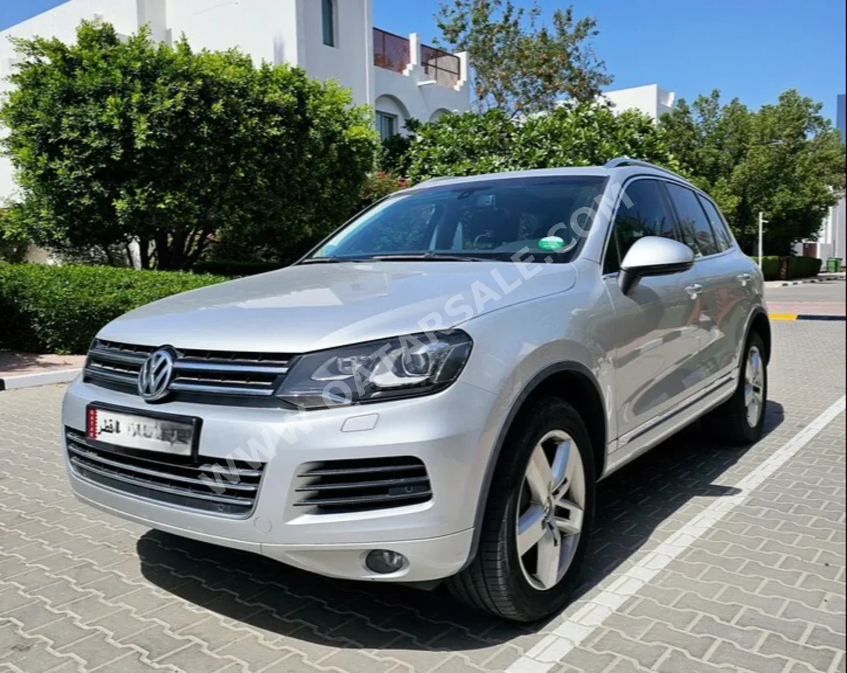Volkswagen  Touareg  Highline plus  2014  Automatic  95,000 Km  6 Cylinder  Four Wheel Drive (4WD)  SUV  Gray