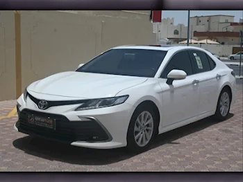 Toyota  Camry  GLE  2023  Automatic  30,000 Km  4 Cylinder  Front Wheel Drive (FWD)  Sedan  White  With Warranty
