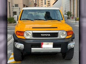 Toyota  FJ Cruiser  2015  Automatic  112,000 Km  6 Cylinder  All Wheel Drive (AWD)  SUV  Yellow