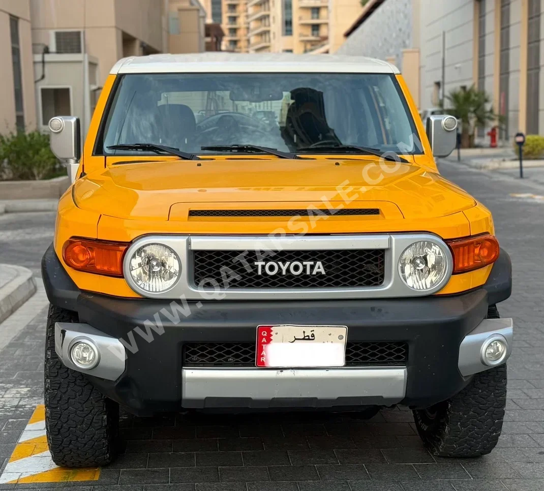Toyota  FJ Cruiser  2015  Automatic  112,000 Km  6 Cylinder  All Wheel Drive (AWD)  SUV  Yellow