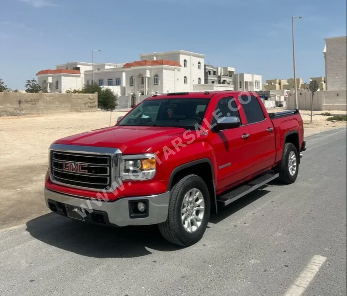 GMC  Sierra  SLE  2014  Automatic  86,000 Km  8 Cylinder  Four Wheel Drive (4WD)  Pick Up  Red