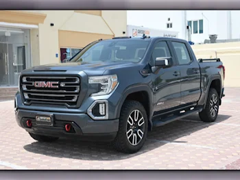GMC  Sierra  AT4  2019  Automatic  61,000 Km  8 Cylinder  Four Wheel Drive (4WD)  Pick Up  Gray
