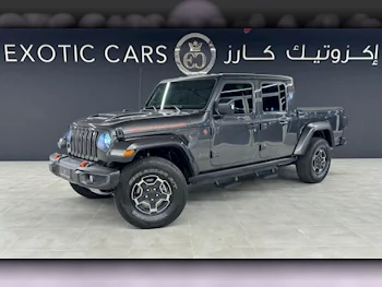 Jeep  Gladiator  Sand Runner  2021  Automatic  34,000 Km  6 Cylinder  Four Wheel Drive (4WD)  Pick Up  Gray  With Warranty