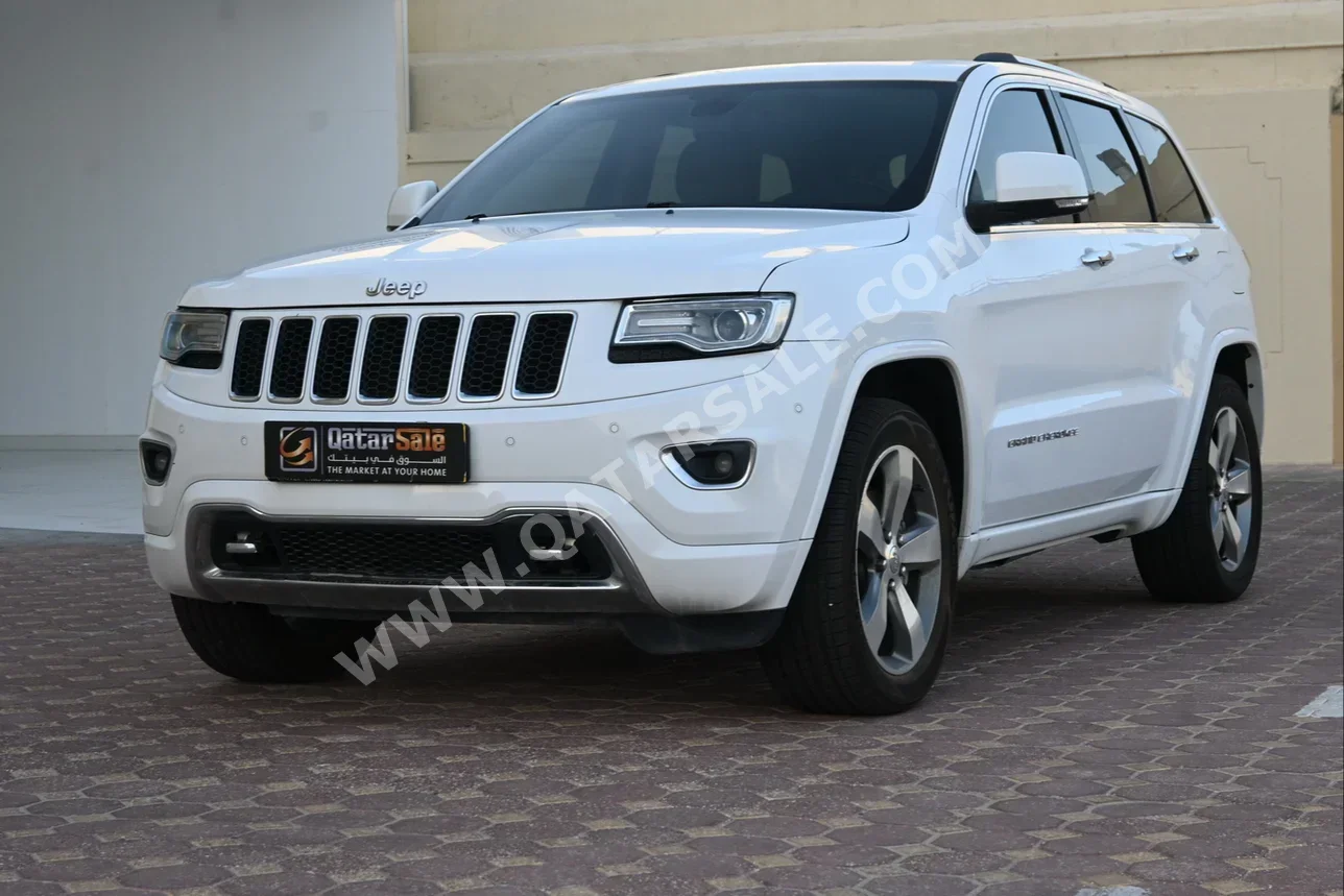 Jeep  Grand Cherokee  Overland  2018  Automatic  87,000 Km  8 Cylinder  Four Wheel Drive (4WD)  SUV  White  With Warranty